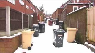 Bins wait for collection in snow [upl. by Simah]