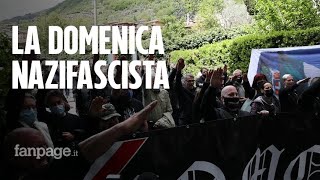 Saluti romani svastiche e selfie con bambini lestrema destra ricorda Mussolini a Como [upl. by Onahpets]