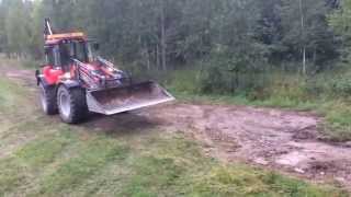 Radiostyrd Huddig 1260 C  Lastning dumper Radio controlled backhoe loader loading a truck [upl. by Ahsenal11]