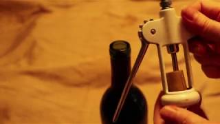 How to Use a Wing  Lever Corkscrew to Open a Wine Bottle [upl. by Ztnahc]