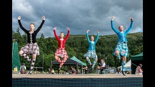 Film of Kenmore Highland Games 2018 with bagpipes dancing and heavy events in Perthshire Scotland [upl. by Yedsnil244]