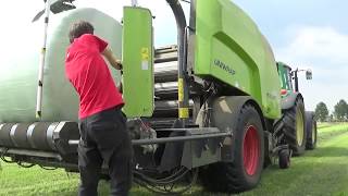 balen persen met john deere 6330 samen met claas rollant 455 uniwrap [upl. by Evy]