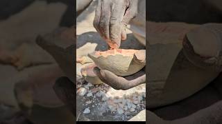 Hadzabe father is making a bowel from buabab fruit for his baby shortfeed africa hadzabe [upl. by Ketty]