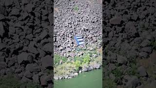 Guy base jumps off the Perrine Memorial Bridge in Twin Falls Idaho with an inflatable boat [upl. by Chitkara657]