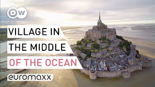 MontSaintMichel  The French Village That Sits Right In The Ocean [upl. by Amoakuh]