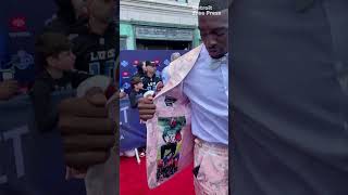 Terrion Arnold Detroit Lions draft pick shows off suit at NFL draft red carpet [upl. by Nelleeus]