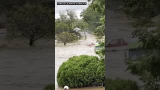 House floats through flooded streets in Asheville North Carolina after Hurricane Helene [upl. by Ahseinat]