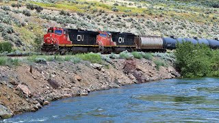 CN And CP Running Trains Thru Canadas Canyon Beside The High Flowing Thompson River CN Ashcroft Sub [upl. by Learrsi]