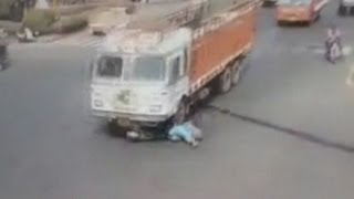 Dramatic crash Trucks runs over woman on scooter [upl. by Adnwahsar]