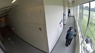 Keanon Lowe disarms embraces student who brought gun to Parkrose High School Surveillance video [upl. by Sacram55]