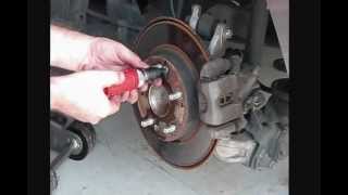 How to replace brake pads and rotors on Honda Civic 2007 part3 [upl. by Maryellen]