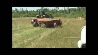 Cutting Hay 15 May 10 with John Deere 5403 and New Holland 492 Haybine [upl. by Vetter]