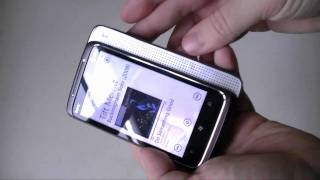 HTC HD7 vs HTC Surround  Pocketnow [upl. by Ruthi]