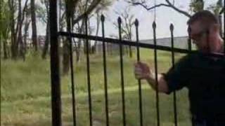 Installing ornamental steel fence on a grade [upl. by Hannaoj]