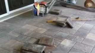 Laying pavers on a pool deck [upl. by Franckot]