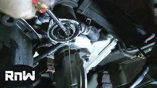 How to Replace a Thermostat on a 97 Subaru Outback 25L Engine [upl. by Stelle]