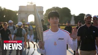 Olympic Torch Relay touches down in host city Paris [upl. by Karlyn390]