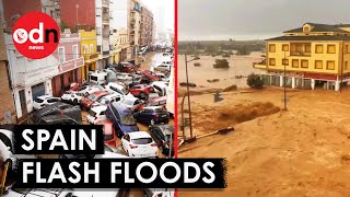 Terrifying Footage Shows Flash Floods in Spain Sweep Away Walls and Cars [upl. by Vani215]