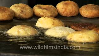 Indian appetizer  Aloo tikki in Chandni Chowk Old Delhi [upl. by Tadashi709]