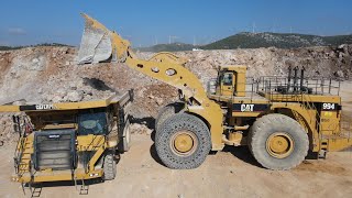 Huge Caterpillar 994 Wheel Loader Loading Caterpillar 777F Dump Truck  Samaras Mining Group [upl. by Eicram175]