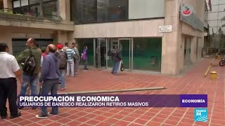 Usuarios de Banesco realizaron retiros masivos ante la intervención del gobierno [upl. by Gnivre748]