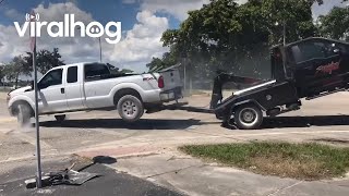 Truck Repossession Fail  ViralHog [upl. by Dnomsaj]