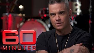 Robbie Williams pays tribute to George Michael  60 Minutes Australia [upl. by Teemus184]