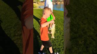 Cute Kid catches BIG BASS and releases him 🥹 fishing heartwarming goodvibes cute bass [upl. by Ahsiyn]