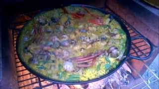 Authentic Paella Recipe Cooked on an Open Fire [upl. by Aniret]