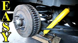 How to Replace Shock Absorbers on your car FAST and Easy [upl. by Arabrab]