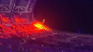 Tom Cruise abseils from roof of Stade de France then rides off on motorbike at the Olympics [upl. by Arayt131]