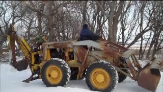 Michigan 55AG Wheel Loader with a Hopto 110 Backhoe [upl. by Belldas]