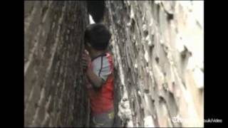 Inflatable mattress used to rescue boy trapped between two walls in China [upl. by Debora]