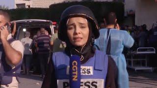 CGTN correspondent breaks down in tears while reporting in Gaza [upl. by Eittap]