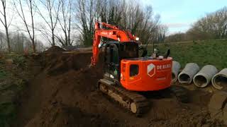 Hitachi ZX135US De Block Verhuur at work [upl. by Aileahcim]