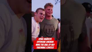 Iowa hawkeye offensive lineman wins the bail of hay throwing contest [upl. by Elyl]