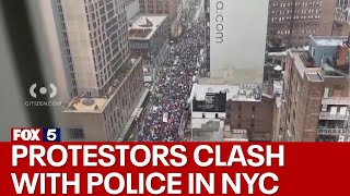 Protestors clash with police in Times Square [upl. by Ayalahs174]