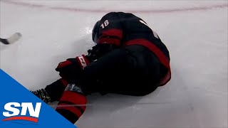 Ryan Dzingel Injured After Awkward Hit Into Boards By Nikita Zadorov [upl. by Gerdeen]