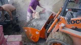 Concrete mixer Kovaco ML 300 on a Locust L 903 skid steer loader [upl. by Aicenert]