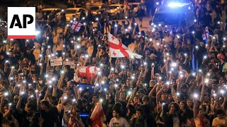 Georgian protesters against Russiastyle media law mark Orthodox Easter with candlelight vigil [upl. by Burnaby967]