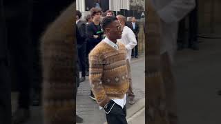 Wizkid attends the Louis Vuitton Mens SpringSummer 2025 show at Paris Fashion Week [upl. by Aniras4]