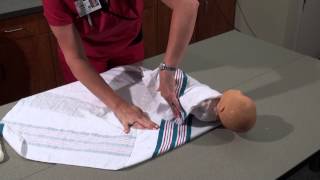 Parenting and Infant Care  How to Swaddle a Baby  Womans Hospital  Baton Rouge La [upl. by Buehrer]