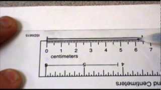 Measuring to the nearest cm and mm [upl. by Pruchno]