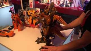 Hasbro Demos The Stomp And Chomp Grimlock Transformer At Toy Fair 2014 [upl. by Esina]