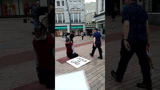 Jesus Christ is Lord Preacher on his knees proclaims Jesus in Cork City Centre city [upl. by Airdnaid]