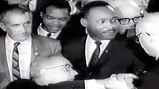 President Lyndon B Johnson signs Civil Rights Act of 1964 with Martin Luther King Jr in attendance [upl. by Nannahs]