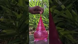 Water balloons popping water out  slow motion water balloon water out balloons motion popping [upl. by Nalyt455]