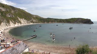 Lulworth Cove On The Jurassic Coast World Heritage Site In Dorset [upl. by Marieann818]