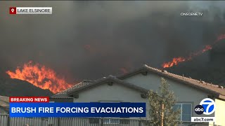 Evacuations ordered in Lake Elsinore as brush fire threatens homes [upl. by Ades]