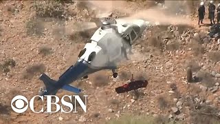 Helicopter rescue of injured woman spins out of control in Phoenix [upl. by Kincaid]